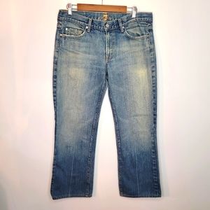 7 For All Mankind | Men's Medium Wash Bootcut Jeans with Fading